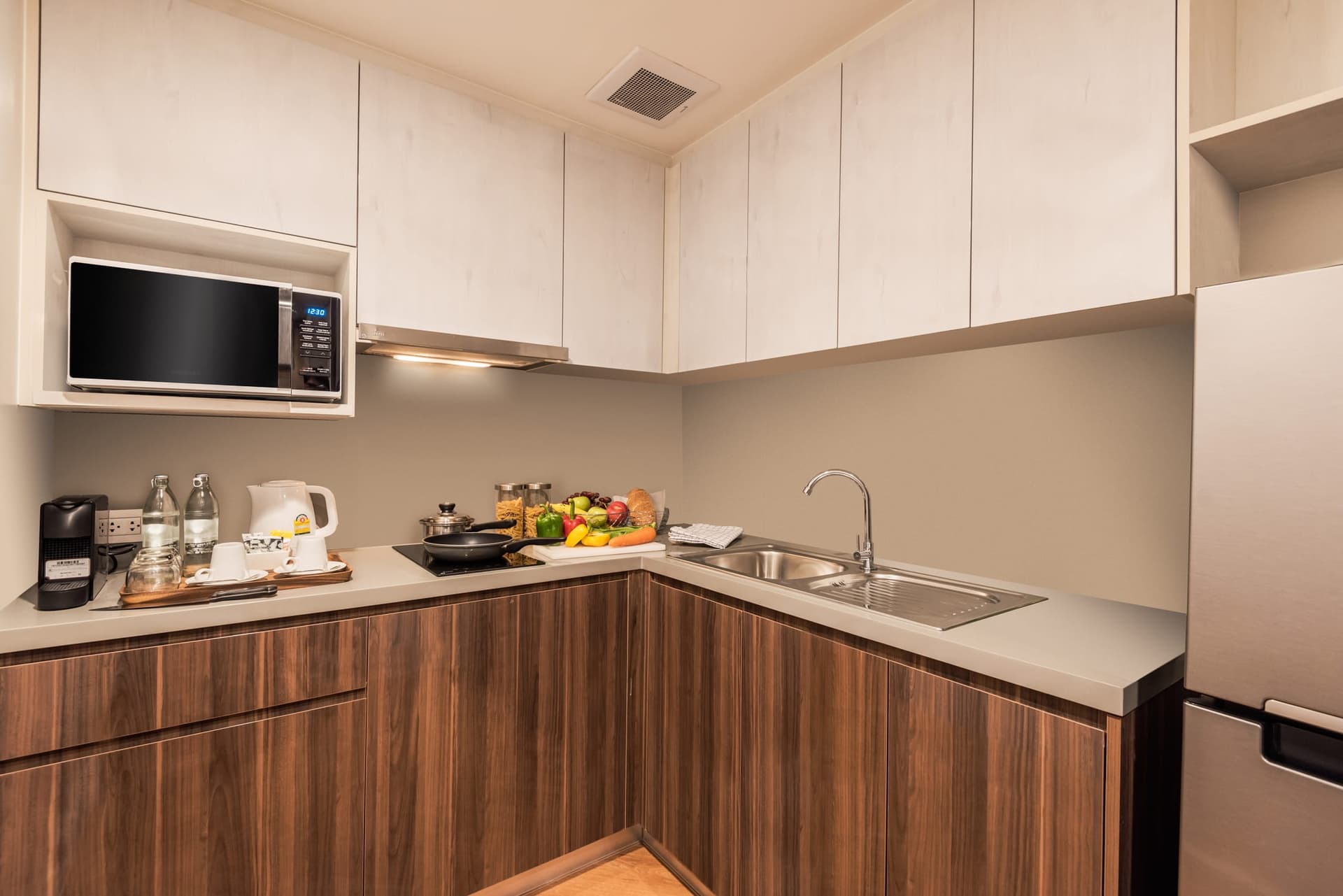 Kitchen in 2 Bedroom Deluxe at Amanta Sathorn