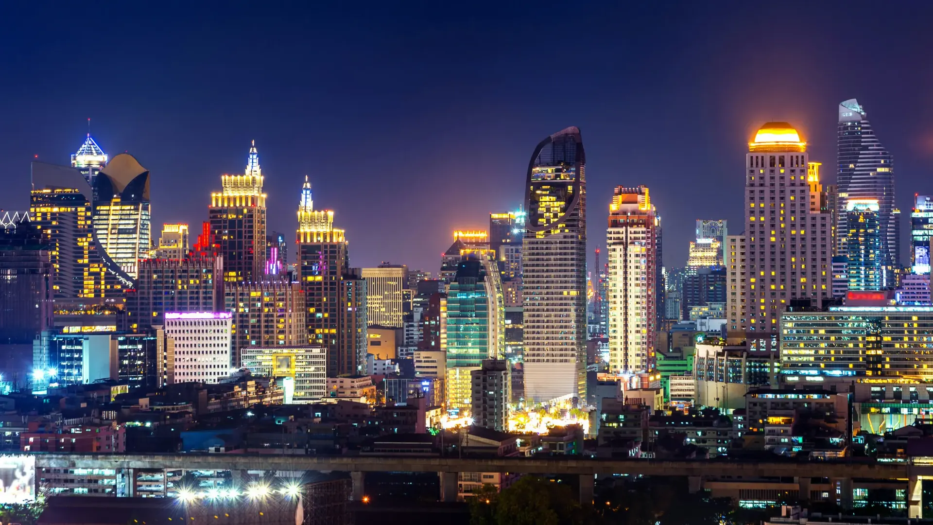 Bangkok skyline and river in the evening