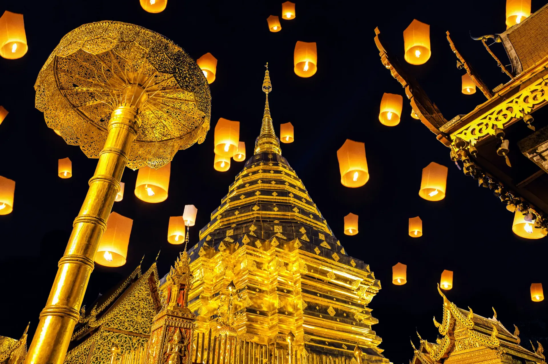 Lantern festival atmosphere at a golden temple in Chiang Mai