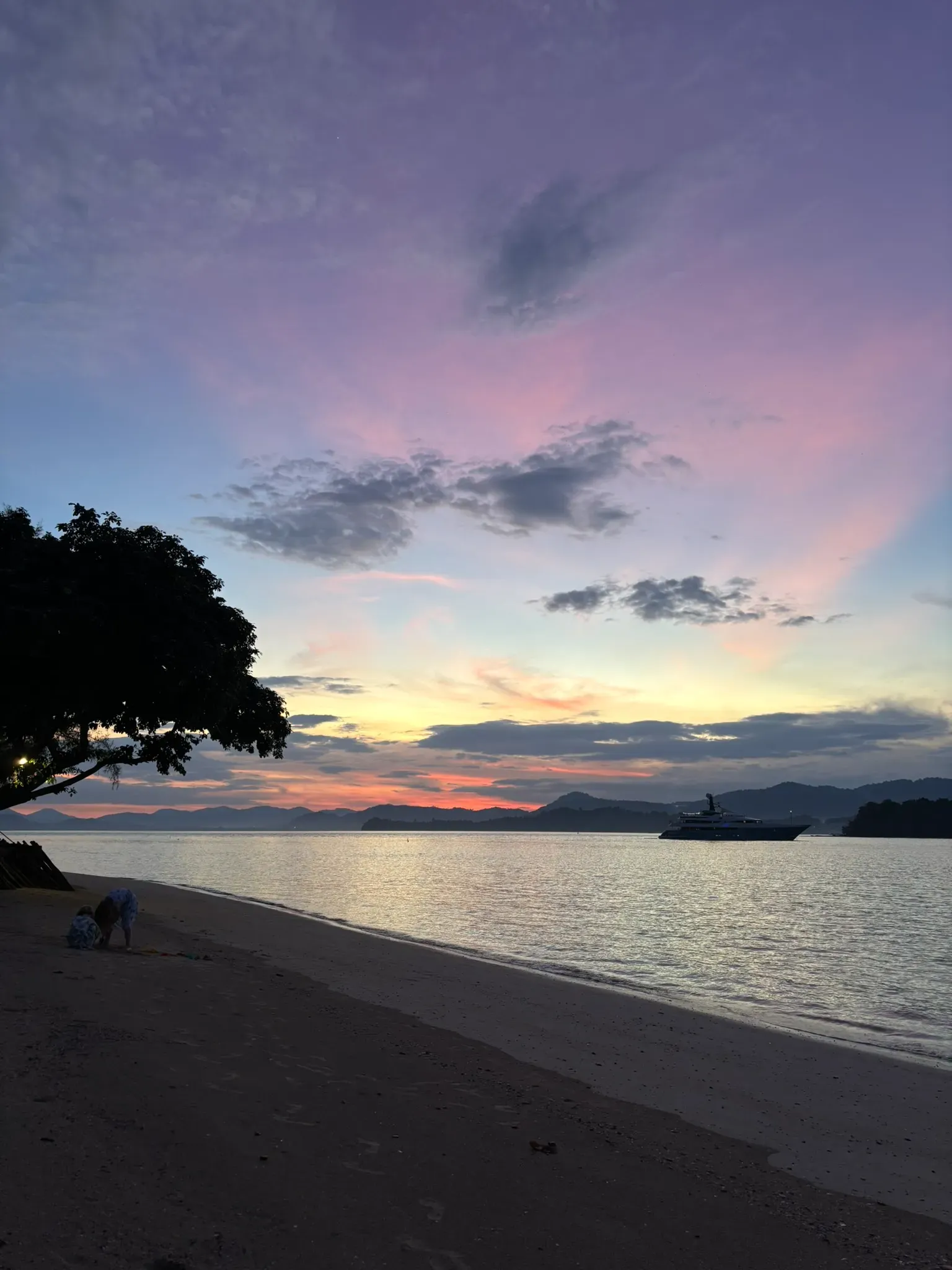 Romantic sunset over a Thailand beach at dusk