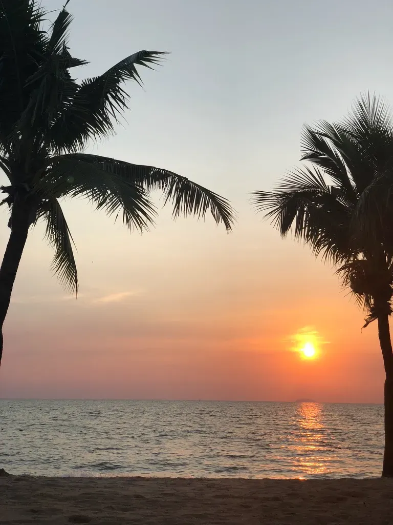 Romantic destination wedding sunset on a Thai beach