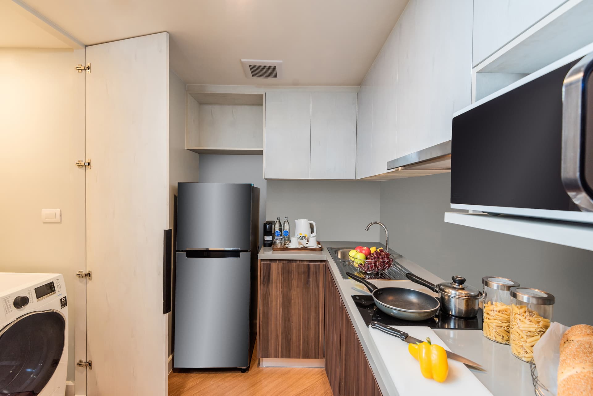 Kitchen in 1 Bedroom Deluxe at Amanta Sathorn