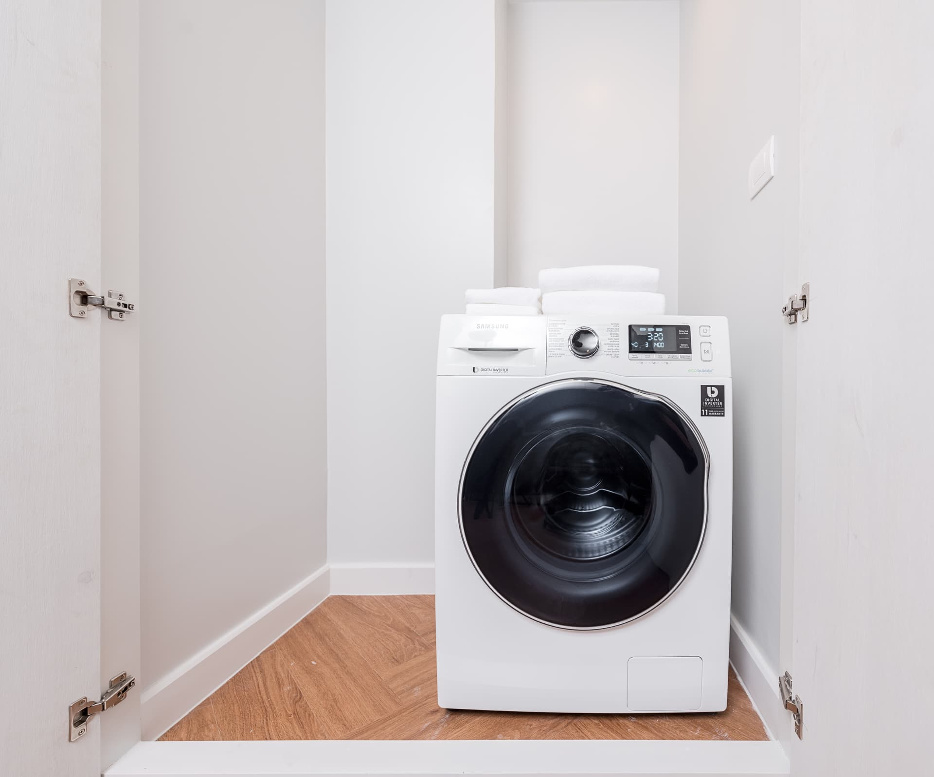 In-unit laundry in 1 Bedroom Deluxe at Amanta Sathorn