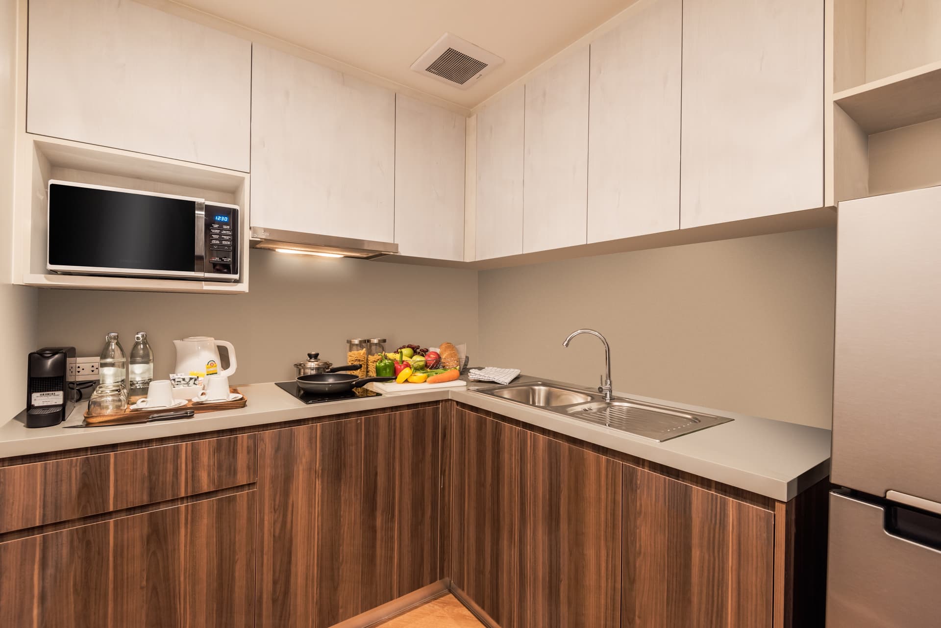 Kitchen in 2 Bedroom Deluxe at Amanta Sathorn