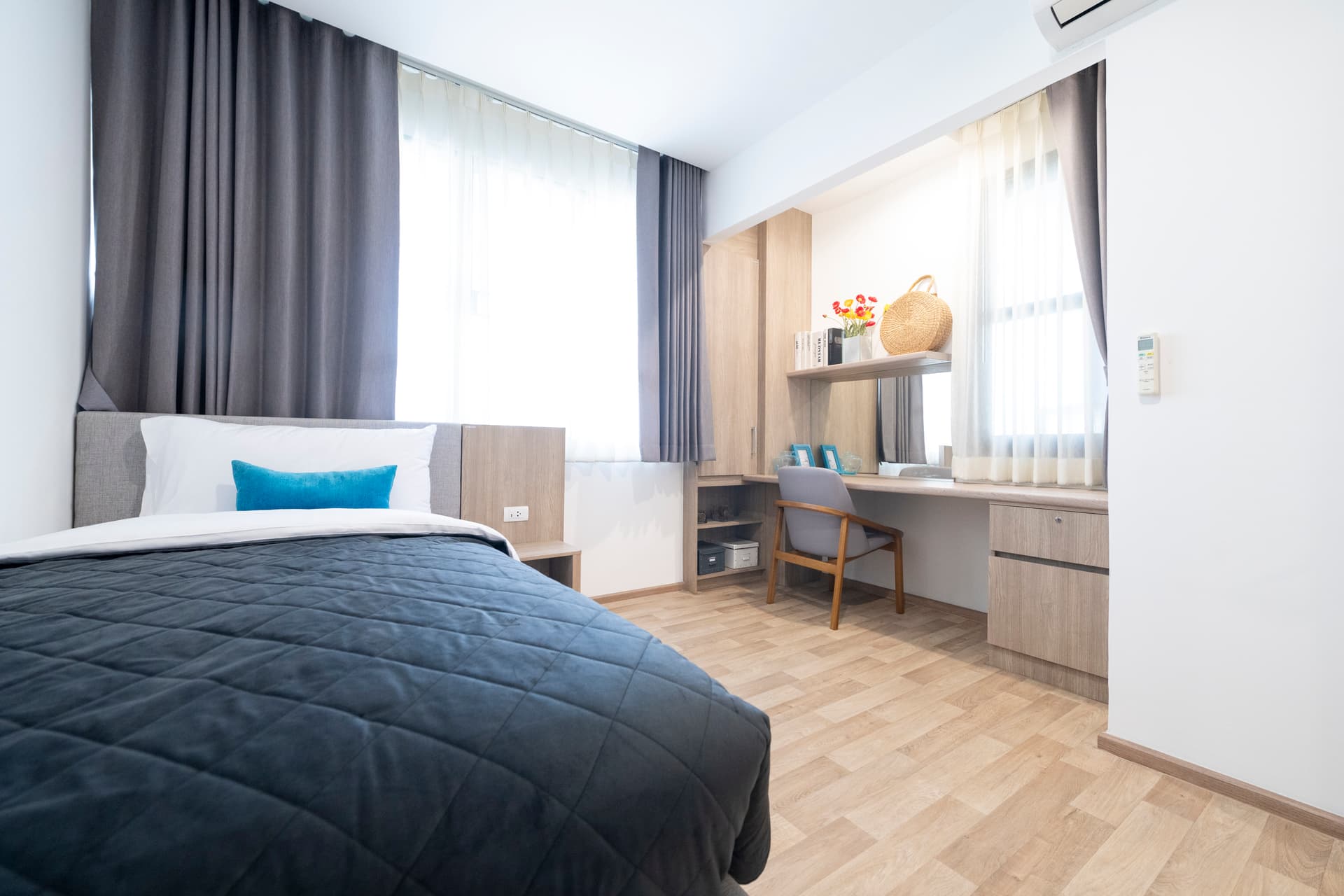 Bangkok apartment bedroom with work space